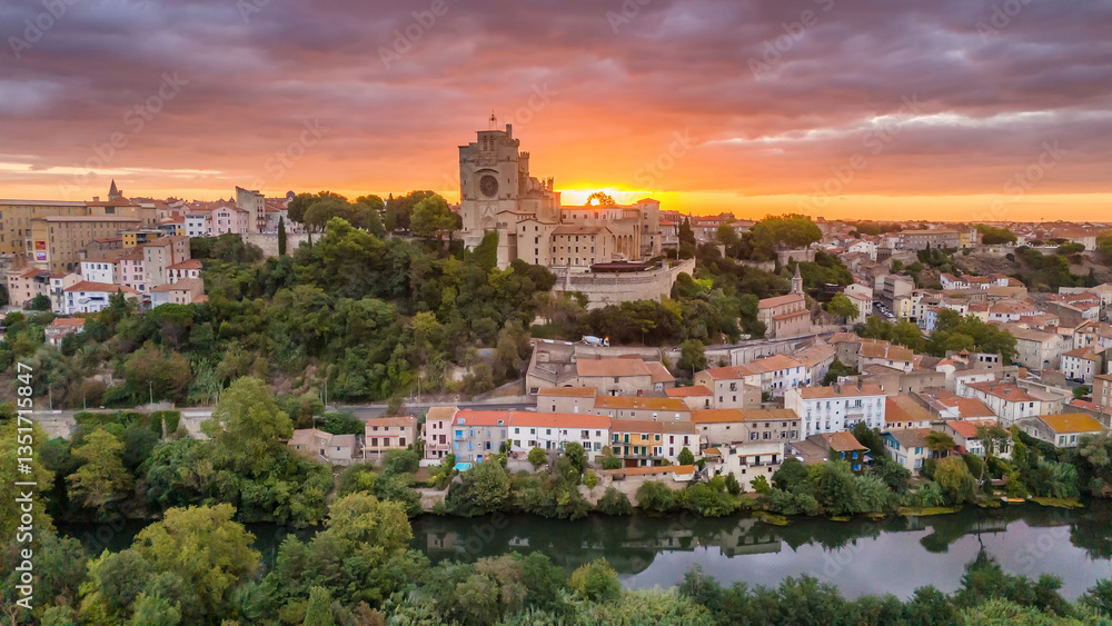 Aerial view of the historic Beziers Cathedral at sunrise, France.