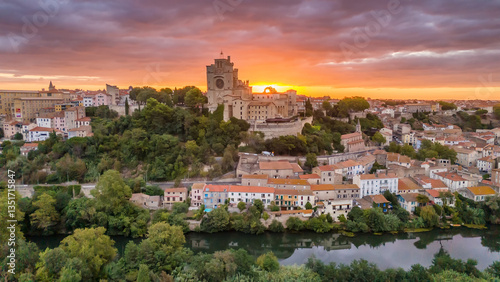 Aerial view of the historic Beziers Cathedral at sunrise, France.