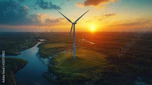 A Wind Turbine and a River at Sunset in a Landscape