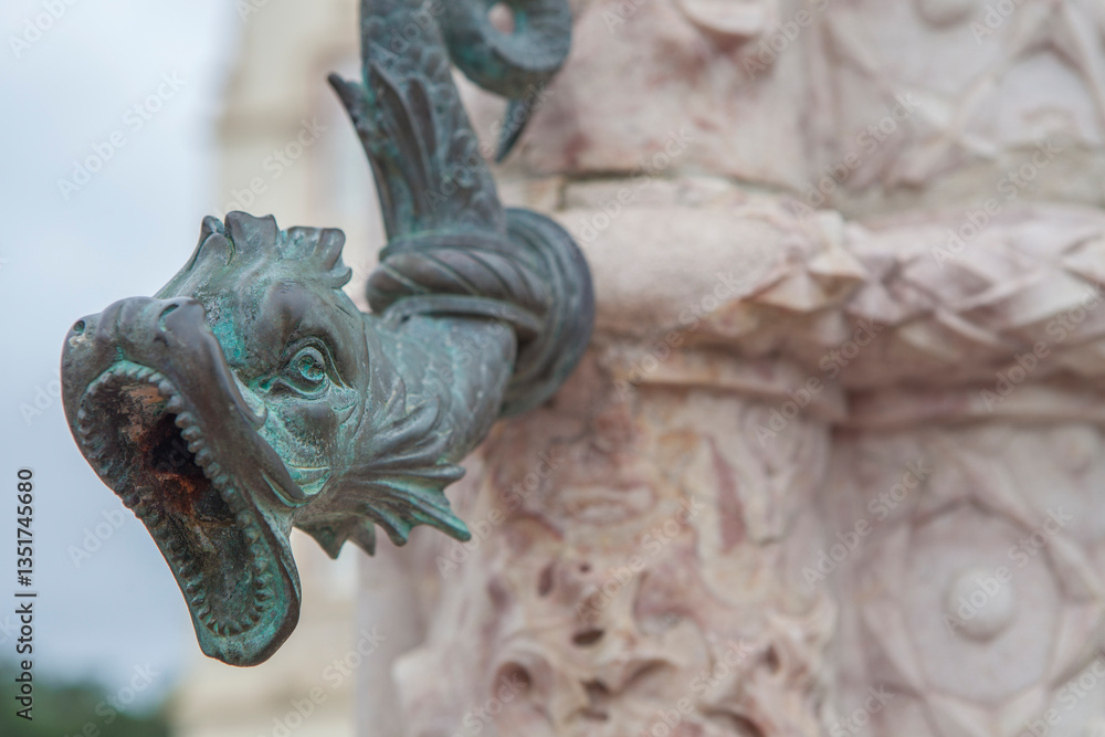 Fish-shaped bronze tap at Municipal building pillory, Sintra, Portugal