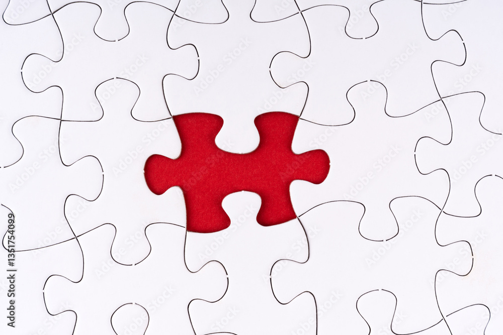 Closeup a set of white jigsaw puzzle and one piece of them is missing Closeup a set of white jigsaw puzzle and one piece of them is missing