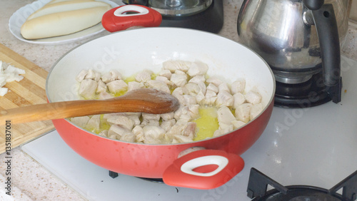 Cooking chicken in pan