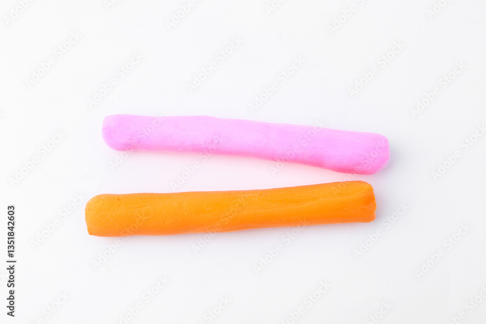 Colorful play dough on white background, above view Colorful play dough on white background, above view