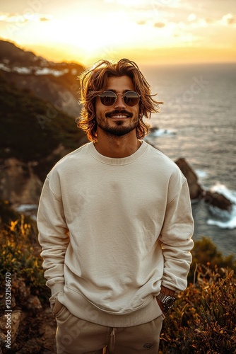 Sunset Coastal Portrait: A Man in Cream Sweatshirt