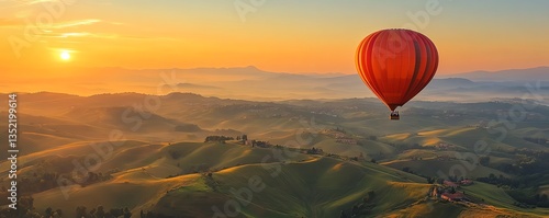 A hot air balloon floating over rolling hills at sunrise, offering a magical view