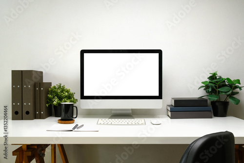 Desktop computer, office supplies, and potted plants on white table
