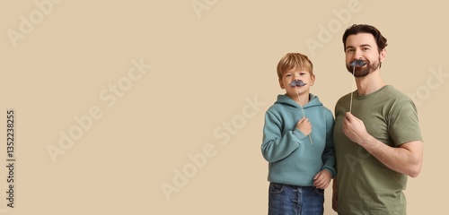 Dad and little son holding ...