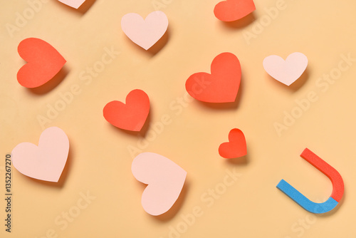 Magnet with paper hearts on...