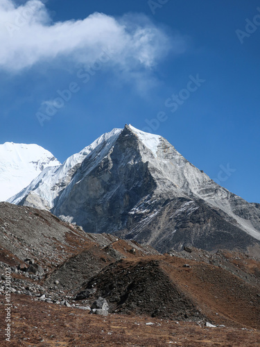 Rocky path leading to snowy Island peak