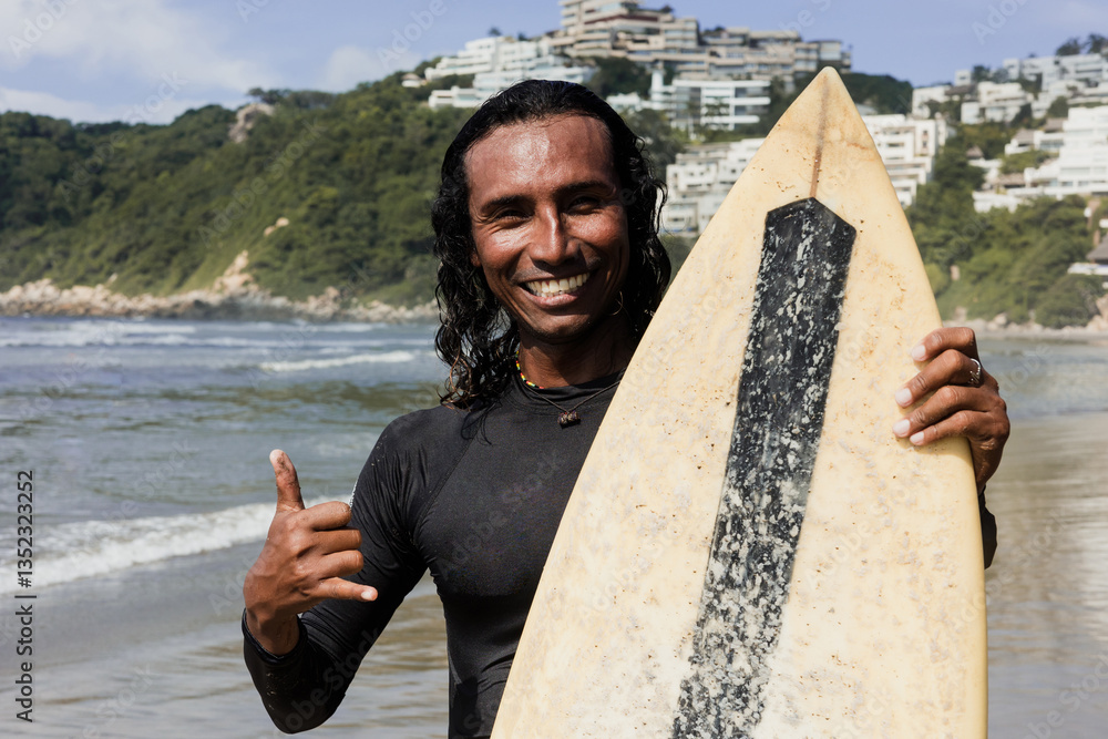 Φωτογραφία portrait of latin surfer man rides the tropical waves in Mexico Latin America, h