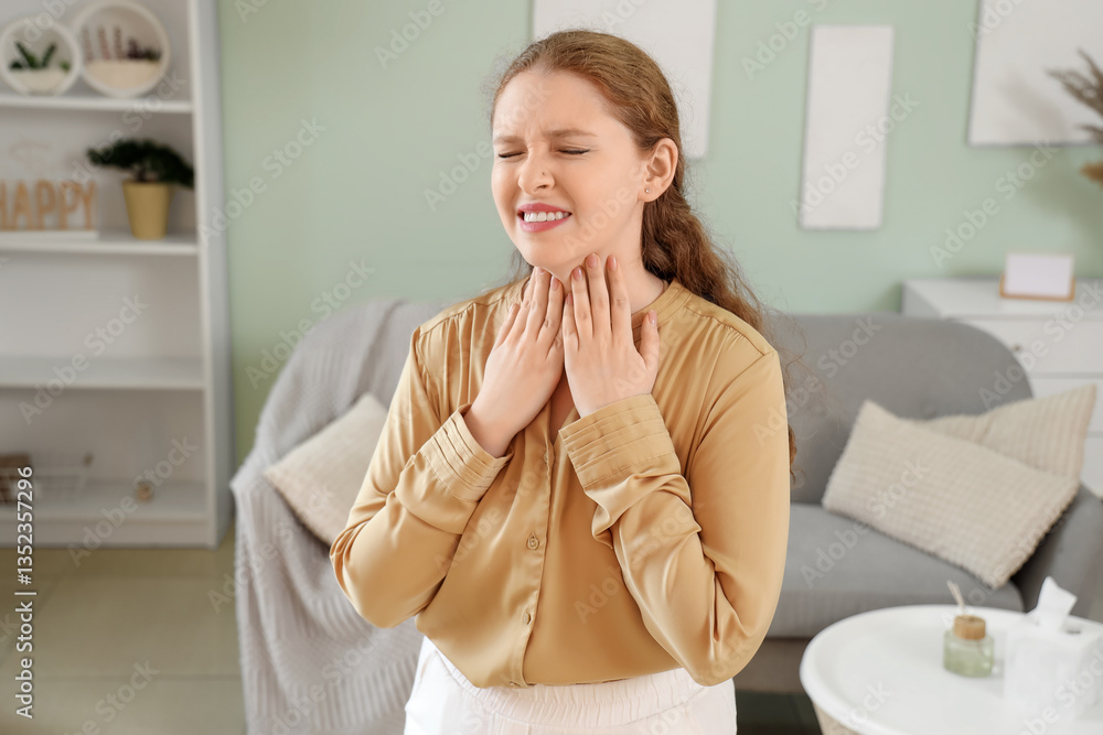 Sick young woman suffering from sore throat at home Sick young woman suffering from sore throat at home