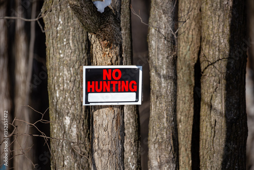No hunting sign nailed to a Wisconsin tree