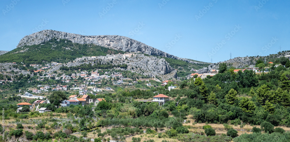 Panoramic Mountain Landscape with Croatian Village of Klis