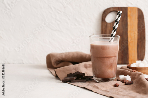 Glass of sweet chocolate mi...
