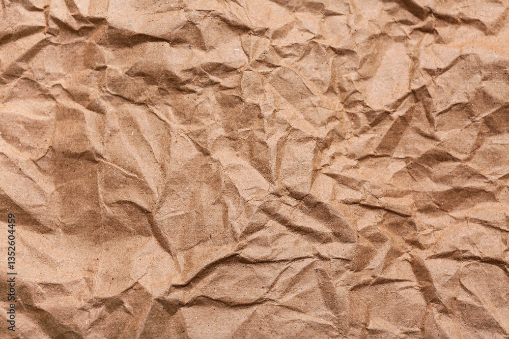 Fototapeta premium Texture of crumpled paper as background, closeup