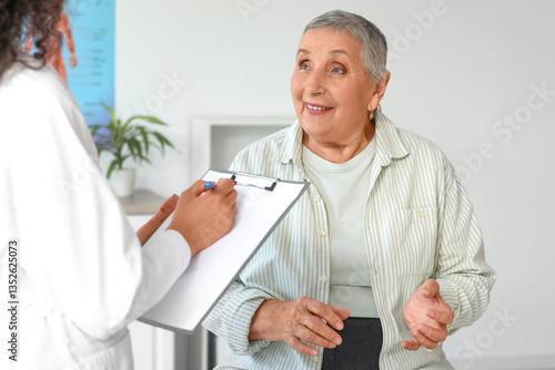 Senior woman visiting docto...