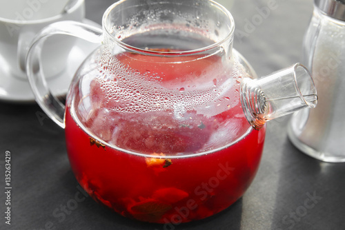 Wallpaper Mural Hot berry tea (cranberries and lingonberries) brewed in a glass teapot Torontodigital.ca