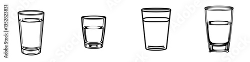 Different types of drinking glasses lined up on a table showcasing a variety of shapes and sizes for various beverages