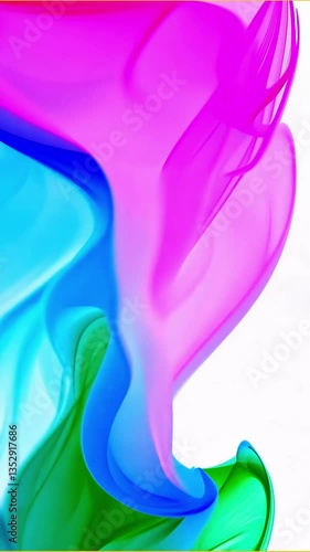 Vibrant colored smoke swirling gracefully against white background. The fluid motion blends magenta, blue, and green hues that flow and mix together, creating dynamic abstract patterns with elegant