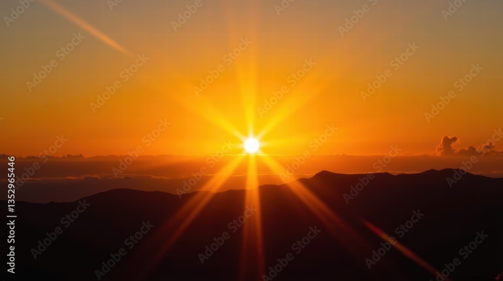 Fototapeta premium Vibrant sunrise over mountain range with radiant sunburst and golden sky