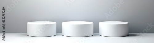 Three white cylindrical display platforms sit in a studio scene