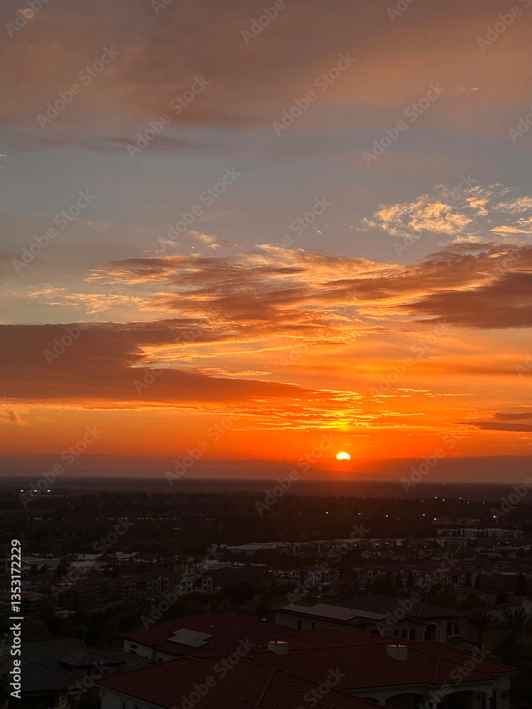 Stunning Sunset Over the Horizon With Vibrant Orange and Golden Hues Near a City Landscape Stunning Sunset Over the Horizon With Vibrant Orange and Golden Hues Near a City Landscape