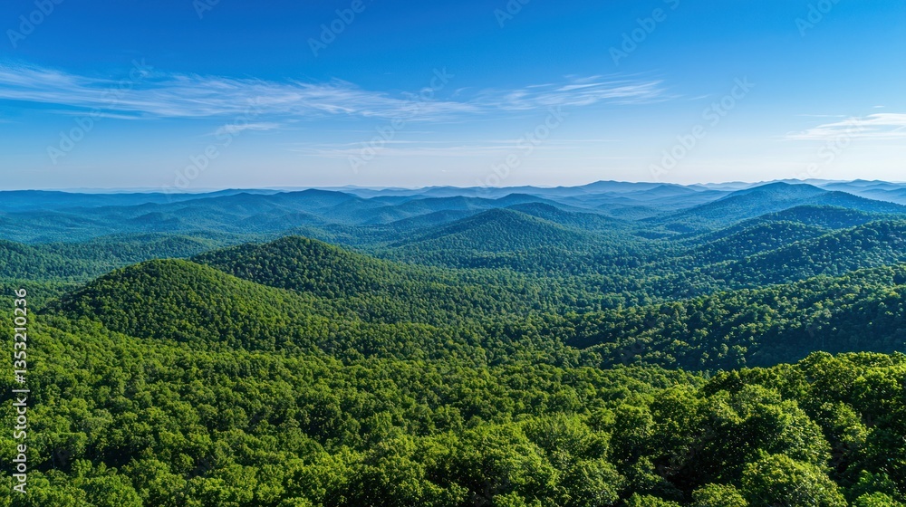 A lush green mountain range with rolling hills under a clear blue sky. A lush green mountain range with rolling hills under a clear blue sky.