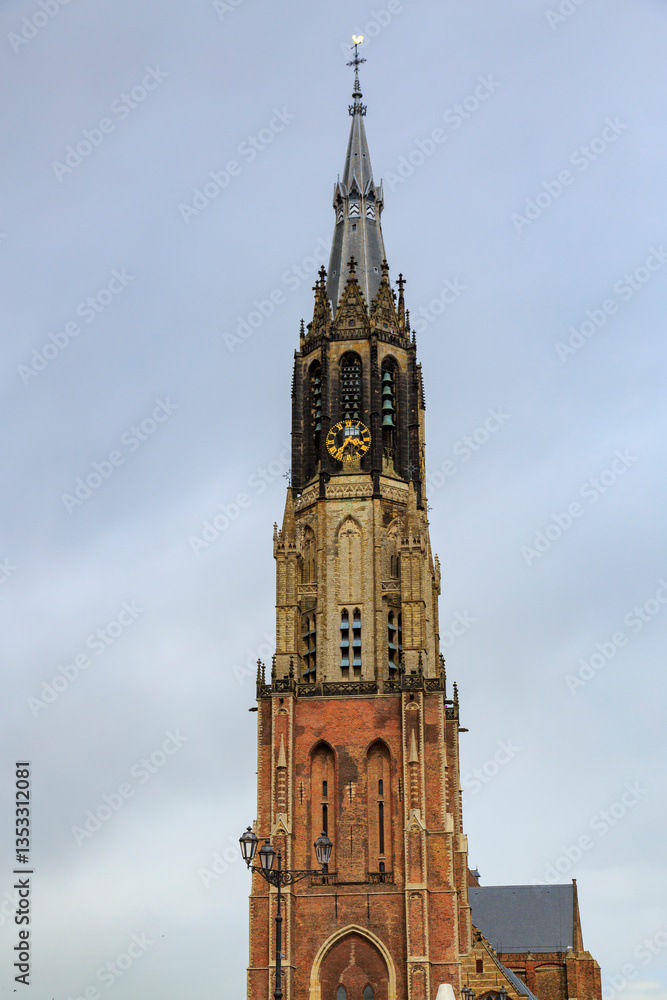 Europe, Netherlands, South Holland, Delft. Exterior steeple and clock tower of Nieuwe Kerk (New Church).