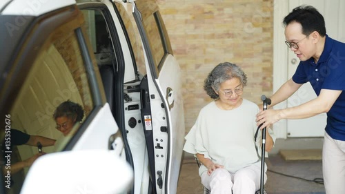 Asian man caregiver or taxi driver helping senior woman patient get in car to get to medical appointments or healthcare therapy sessions at hospital. Assisted elderly patient transportation services.