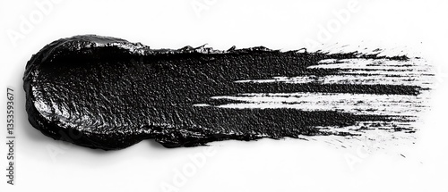 A single long black smudge displayed on a white background