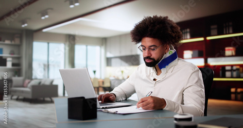 Obraz na płótnie Photo Title: Young Black Man Working From Home w salonie