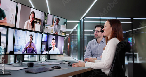 Wallpaper Mural Professional Woman and Mature Executive Hold Online Video Conference Torontodigital.ca