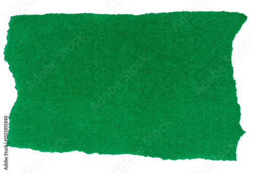 Isolated torn green piece of matte paper on white background