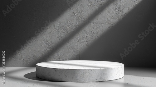 Minimalist concrete podium in sunlit room.