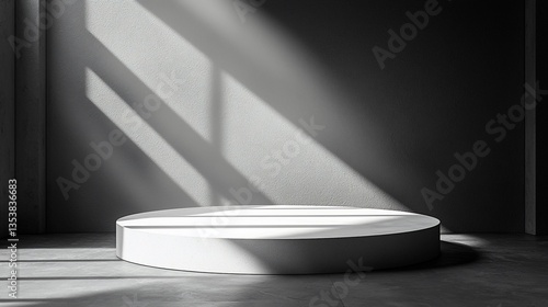 Minimalist white podium in sunlit room.