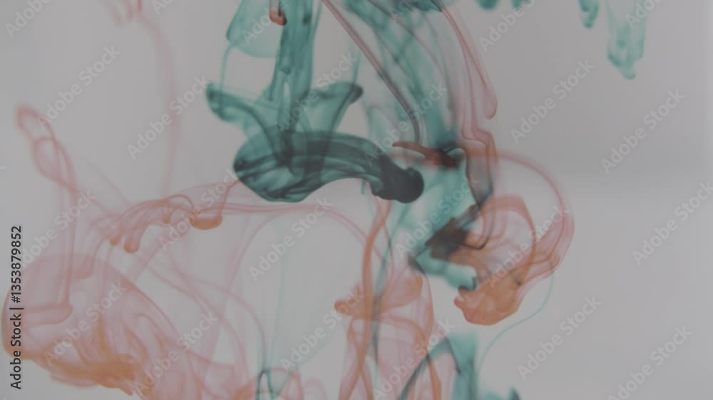 Colored ink spreading in water. Abstract smoke effect