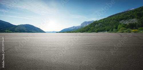 Panoramic empty asphalt road and green mountain natural scenery background under the blue sky.