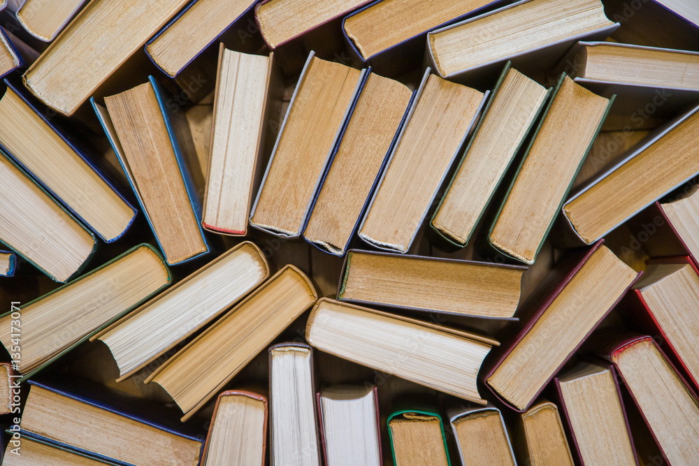 Obraz premium Top view of many books in the library. Back to school.