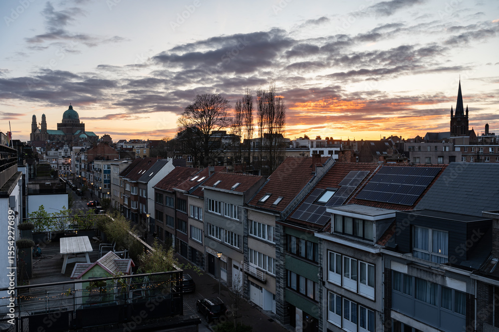 Obraz premium Landscape view over the city apartments and houses with the Basilica of the Sacred Heart in the background, Jette, Brussels Capital Region, Belgium