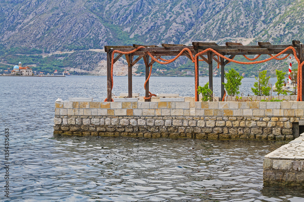 Small Stone Pier Dock at Kotor Bay Spring Day in Montenegro