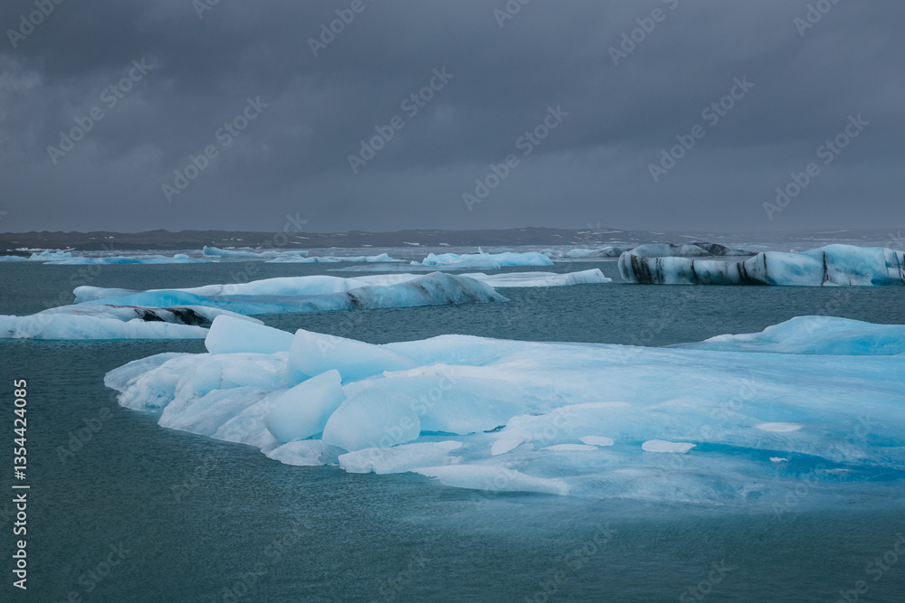 Glacial mountains in Iceland, showcasing rugged peaks and icy landscapes. A breathtaking view of nature's raw power, shaped by time and elements. Perfect for travel, adventure, and nature themes.