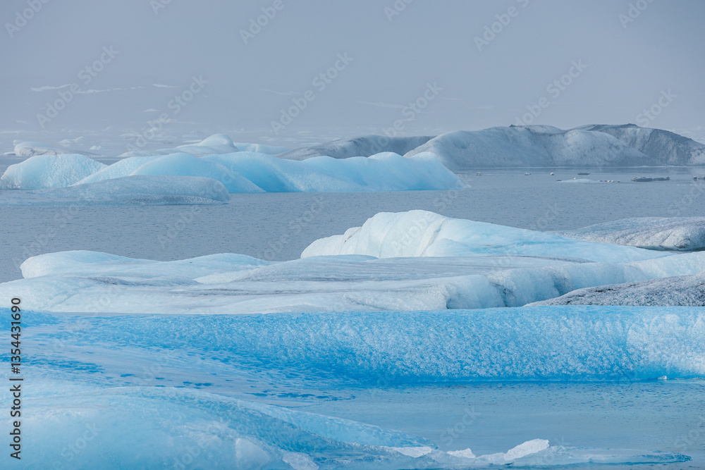 Glacial mountains in Iceland, showcasing rugged peaks and icy landscapes. A breathtaking view of nature's raw power, shaped by time and elements. Perfect for travel, adventure, and nature themes.