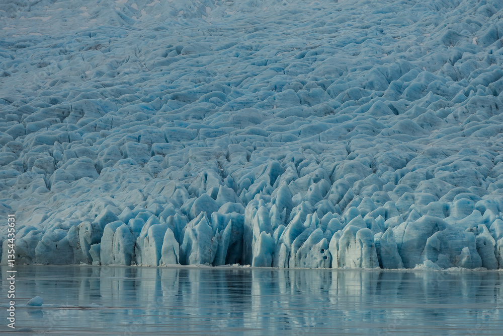 Glacial mountains in Iceland, showcasing rugged peaks and icy landscapes. A breathtaking view of nature's raw power, shaped by time and elements. Perfect for travel, adventure, and nature themes.