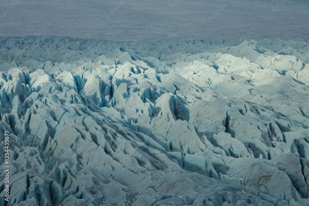 Glacial mountains in Iceland, showcasing rugged peaks and icy landscapes. A breathtaking view of nature's raw power, shaped by time and elements. Perfect for travel, adventure, and nature themes.