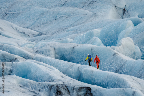 Obraz na płótnie Explore thrilling activities on Iceland’s glaciers: ice hiking, glacier climbing, ice caving, snowmobiling, and glacial lagoon tours. A perfect adventure for thrill-seekers and nature enthusiasts. w salonie