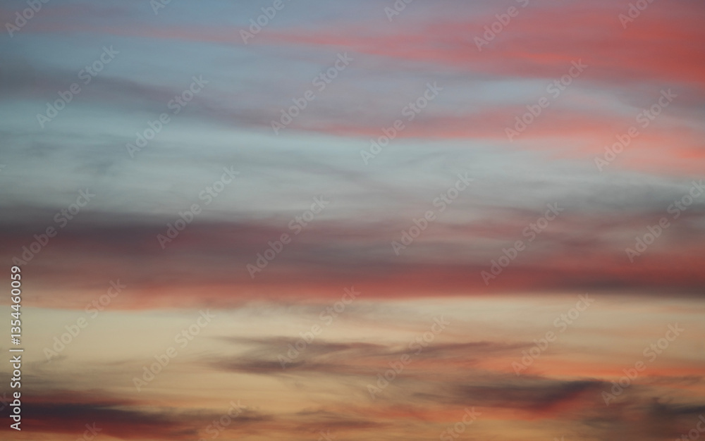 Fototapeta premium Beautiful bright evening sunset sky with dark clouds. Sunset sky background.