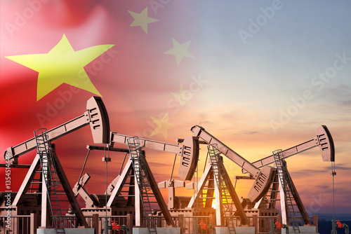 Photography Oil pumpjacks against the sunset with China flag