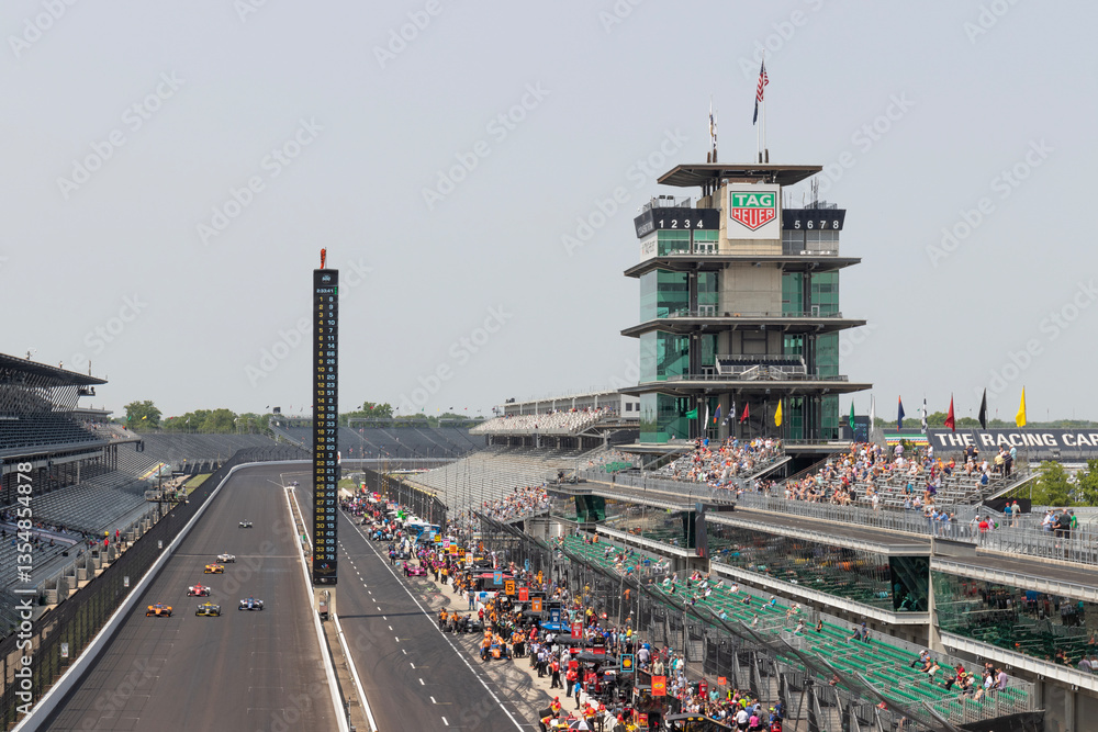 Obraz premium Indy 500 practice sessions at Indianapolis Motor Speedway, including the IMS Pagoda. IMS is The Racing Capital of the World.