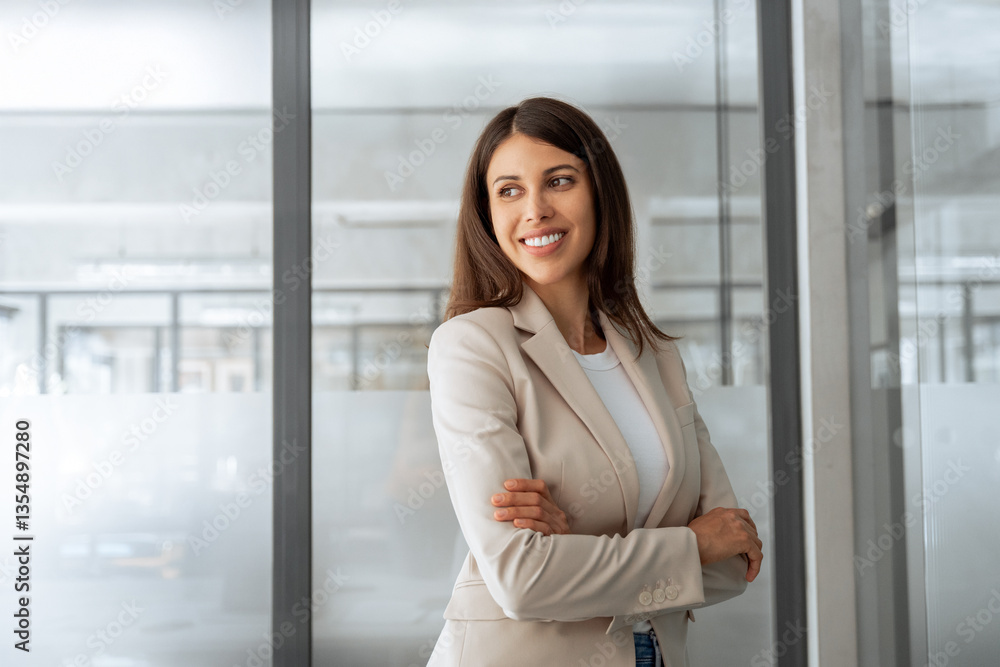 Friendly leader smiling latin hispanic, middle eastern business woman standing dreaming in office looking at copy space. Portrait of middle age manager adult entrepreneur businesswoman at workplace Friendly leader smiling latin hispanic, middle eastern business woman standing dreaming in office looking at copy space. Portrait of middle age manager adult entrepreneur businesswoman at workplace