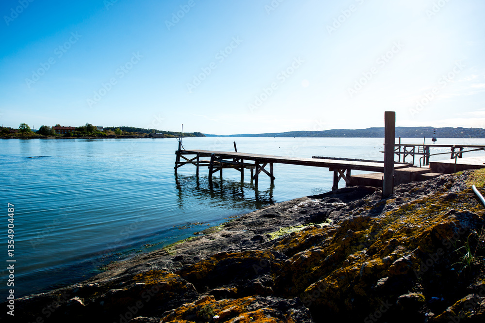 Small Wooden footbridges in island Lindoya in Oslo Fjord, Norway Small Wooden footbridges in island Lindoya in Oslo Fjord, Norway